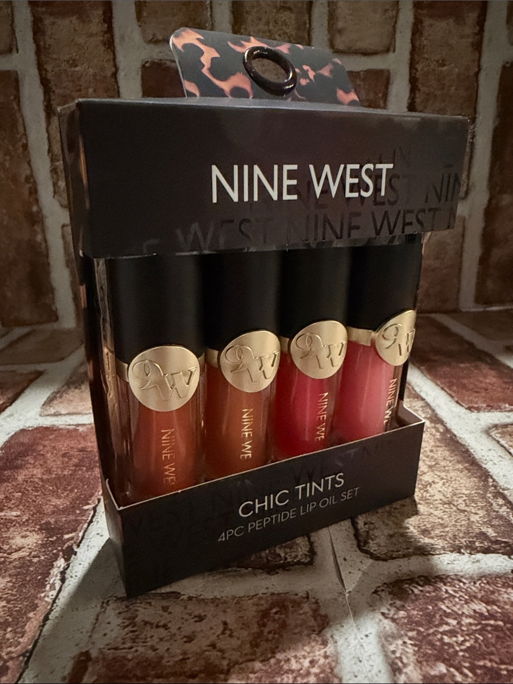 Nine West Chic Tints 4-Piece Lip Oil Set in Coral, Peach, Rose and Berry